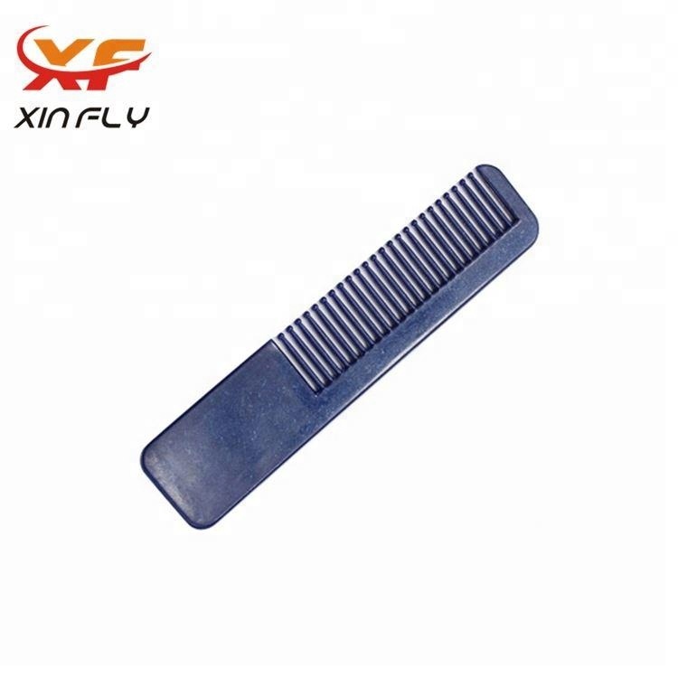 One-time small hotel amenity comb with logo