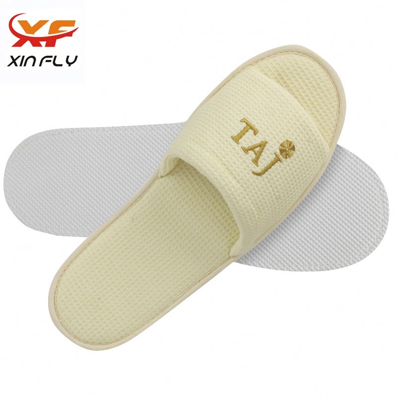 Sample freely EVA sole waffle hotel slippers for Guests