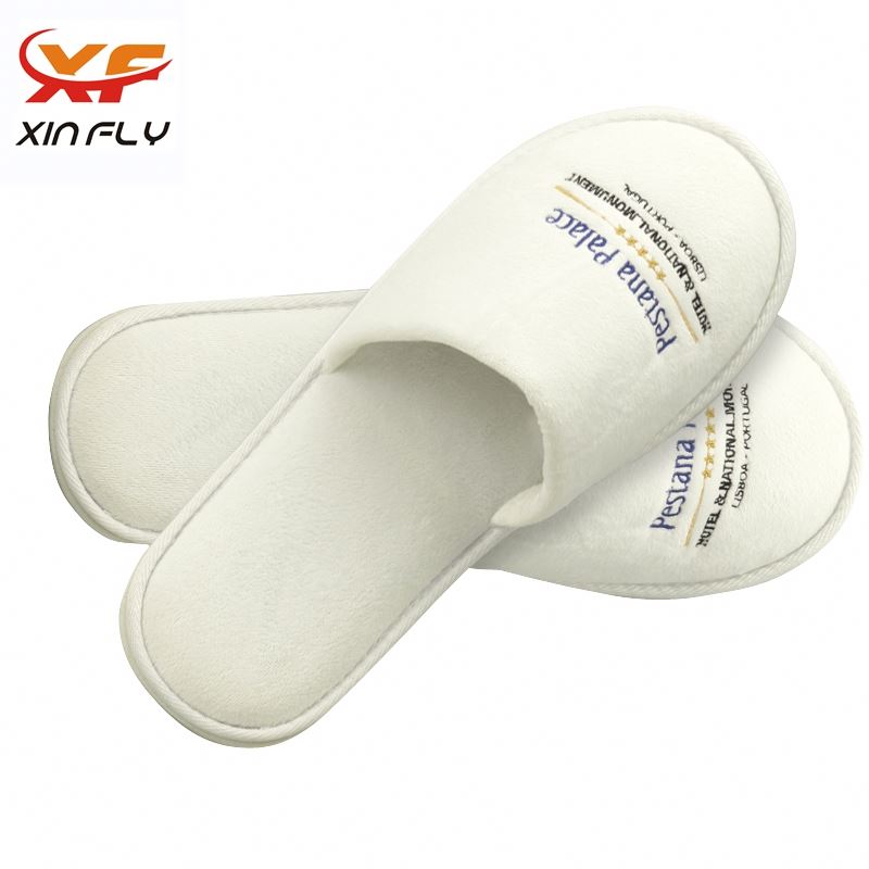 Sample freely EVA sole closed toe hotel slipper with label