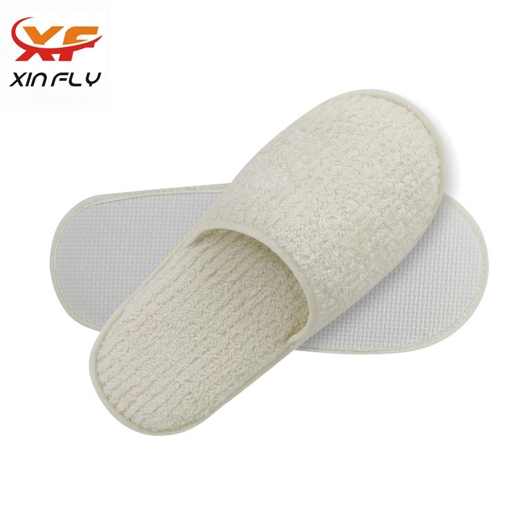 Cheap Closed toe plush hotel slipper supplier